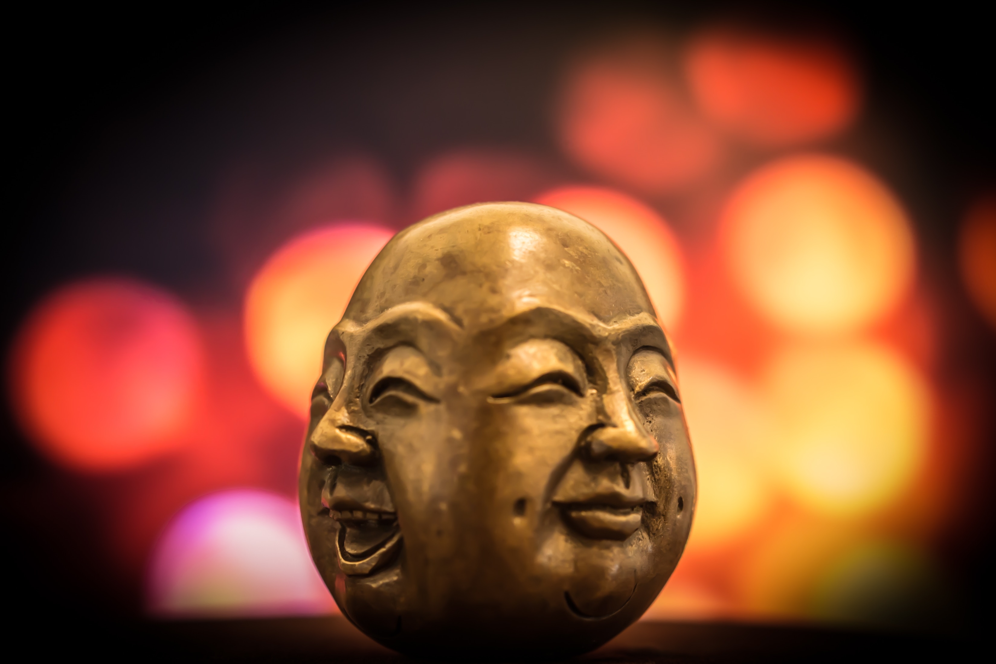 Buddha faces with happy expressions 